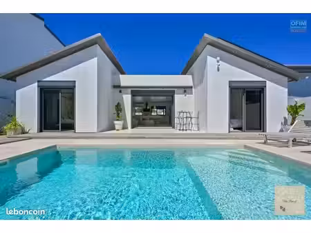 villa floé'a – élégance contemporaine  piscine au sel et vue sur l’ouverture du cirque de 