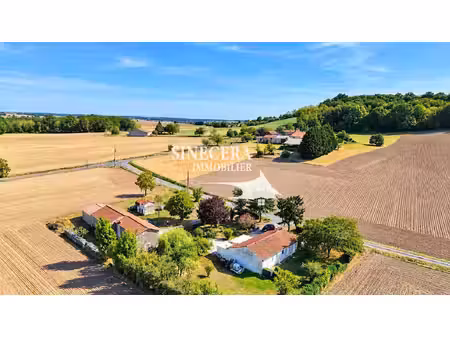 deux maisons avec grange et hangar