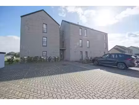 appart. 2 ch.au rez avec terrasse + 2 places de parking!