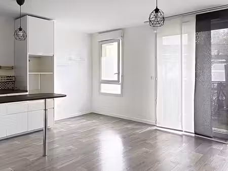 duplex 64 m² - 2 chambres- balcon - parking privatif