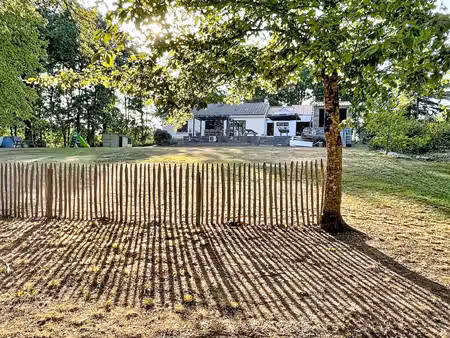 maison de 122m² au centre d’un parc arboré.