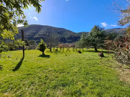 lot : maison de 3 appartements et terrain constructible de 7