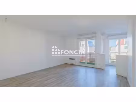 appartement 3 pièces 59 m² avec balcon- double parking et cave