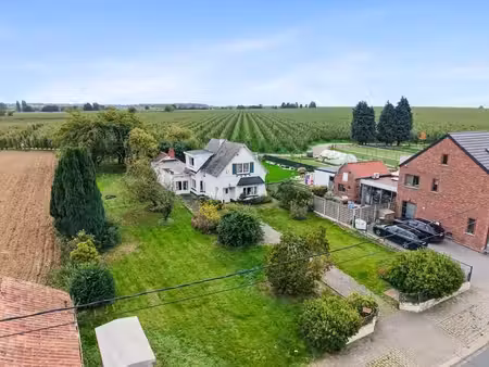 te renoveren woning met grote tuin en aanpalende bouwgron...