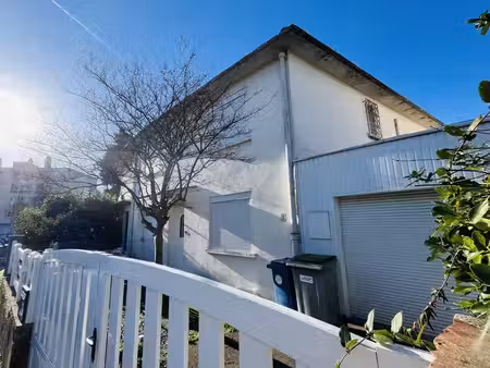 maison avec garage et jardin