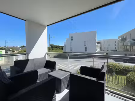 a vendre à séné poulfanc appartement 56 m²  bon état  balcon  ascenseur  place de parking 