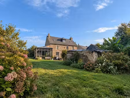 longère en pierre rénovée avec véranda de 30 m² – saint-guinoux