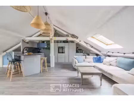 appartement sous les toits à la charpente apparente