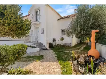 maison familiale avec grand garage et espace de réception