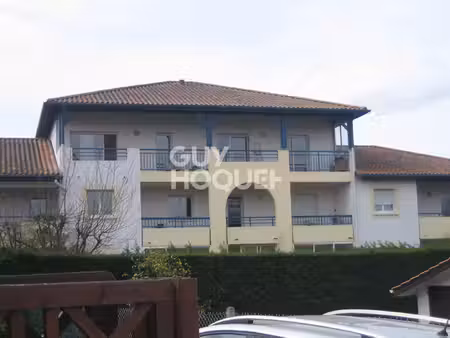 appartement de standing t4 avec grande terrasse couverte+ parking + cave 97m²