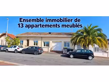 ensemble immobilier. immeuble de rapport avec 13 appartements loués meublés sur talence. r