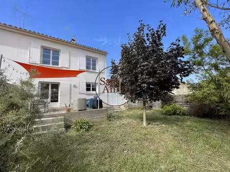 maison d'environ 76 m² avec jardin et terrasse
