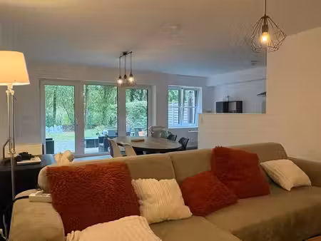 gelijkvloers appartement met 1 slaapkamer en tuin