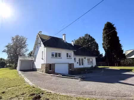 maison (4ch + sdd + sdb)  jardin  remise  et 2 garages.