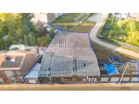 terrain avec projet- permis de 5 appartements accepte