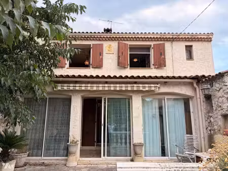 maison familiale de caractère avec jardin  garage et fort potentiel