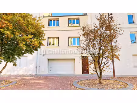 plein coeur de roanne - maison de ville avec garage à fort potentiel