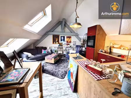 lons-le-saunier (39 jura)  à vendre appartement sous combles centre-ville  2 chambres  65.