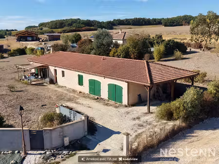 a vendre maison contemporaine de plain-pied  double garage  carport et terrain de 1 731 m²