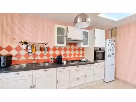 état irréprochable pour cette coquette maison de centre ville