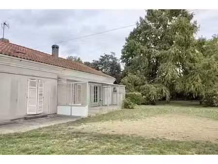 grand terrain avec maison / projet investisseur