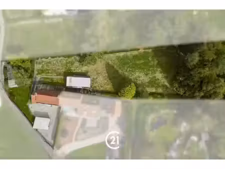 te renoveren woning op een ruim perceel van 2.220 m²