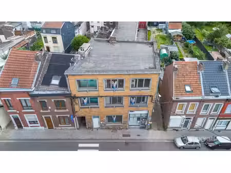 immeuble de rapport-2 appart + rdc commercial - ideal invest