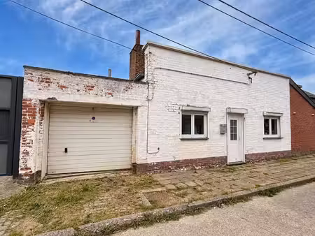 maison à rénover située dans une rue calme !