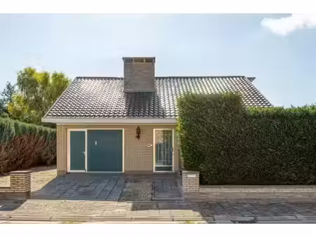 bungalow indépendant avec garage et jardin orienté plein sud