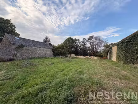 terrain de 1064 m² au calme proche des commerces