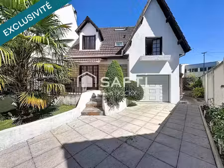 spacieuse maison avec garage et agréable jardin