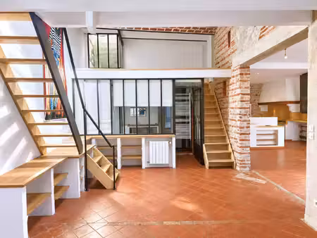 un appartement esprit loft  en duplex  avec du caractere  au