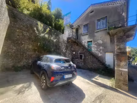 maison avec grand garage et cour