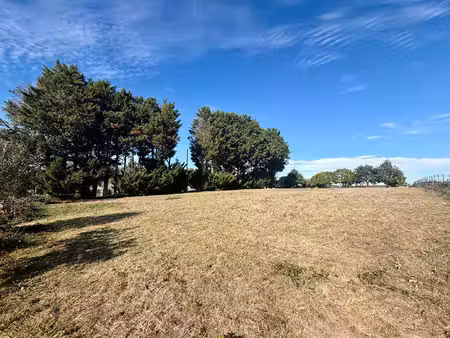 terrain à bâtir 703 m²