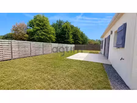 maison de plain-pied de 60 m2 avec garage et jardin à mouill