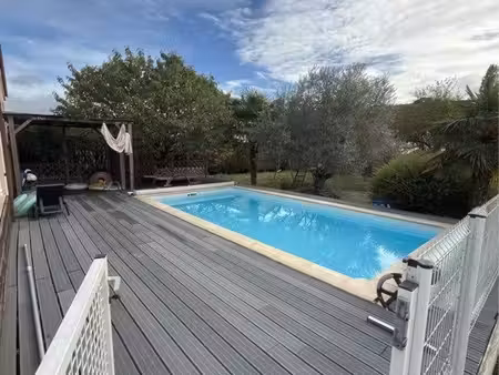 belle maison plain-pied de 100 m² avec piscine  garage et grand séjour lumineux