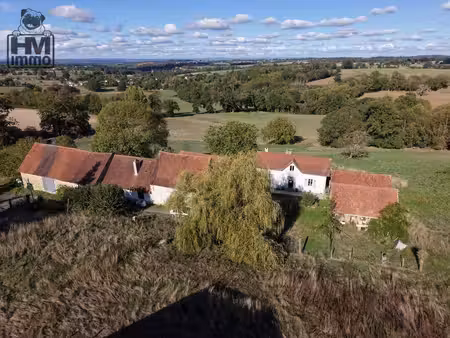 2 maisons+granges+3 ha