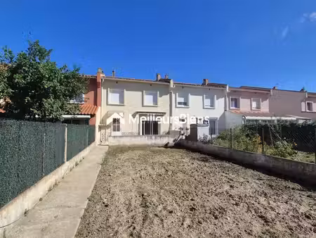 maison 2 faces avec garage