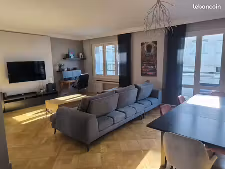 grand appartement traversant de 104 m² avec ascenseur  extérieur et garage fermé équipé ve