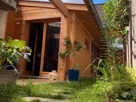 local commercial avec maison habitable indépendant et jardin