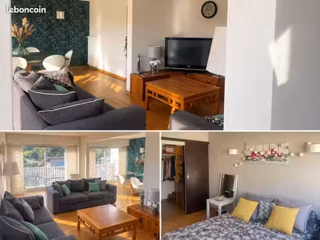 appartement traversant t5 de 95 m² avec balcon  parking privé  cave et ascenseur