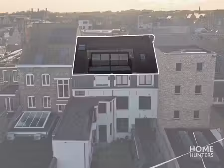 ruim dakappartement met royaal terras en een schitterend uitzicht over ieper