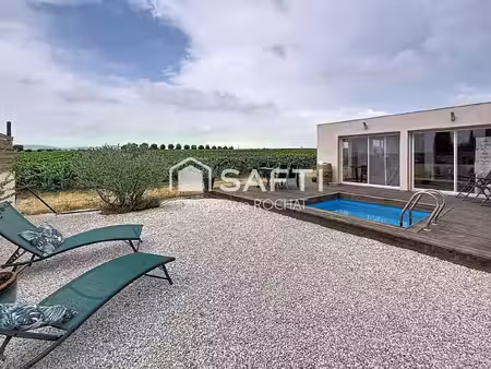 villa moderne de plain-pied de 109 m² située à adissan avec une piscine