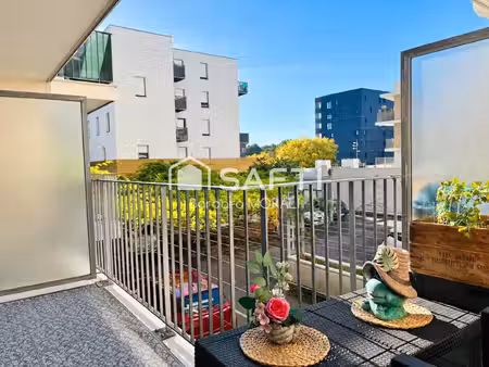 appartement t3 59 m² - balcon  ascenseur  parking