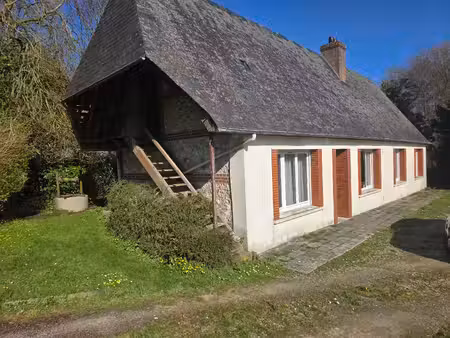 a la campagne longère de caractère avec bâtiment en colombages