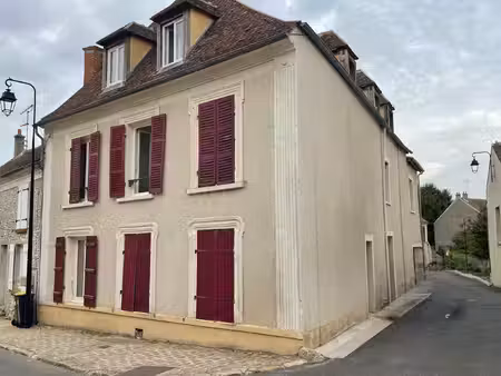 maison divisée en 3 logements