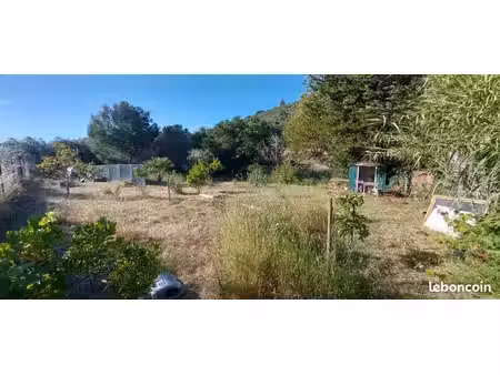 terrain 6200 m² avec puits