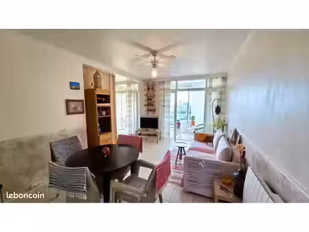 canet-en-roussillon – appartement traversant avec espace nuit séparé  loggia et petite vue