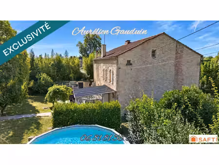 maison en pierre avec 5 chambres  piscine et accès voie verte à fumel