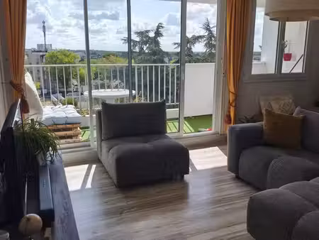 appartement 77 m² – 2 chambres – balcon – parking – dpe c – travaux récents